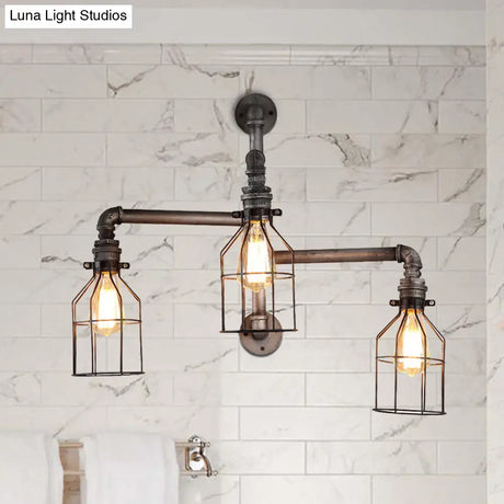 Vintage Bronze Metal Sconce Light With Wire Guard And Pipe Design - Ideal For Coffee Shop Lighting