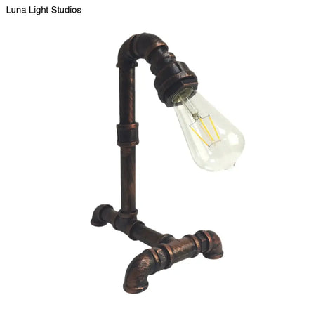 Vintage Rust/Black Metal Arm Night Table Plug-In Lamp With Exposed Bulb
