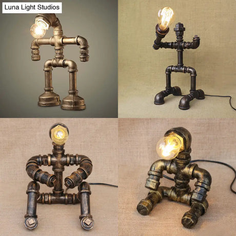 Vintage Stylish Sitting Robot Wrought Iron Table Lamp With Antique Brass Plumbing Pipe