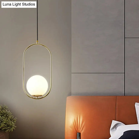White Glass Pendant Light With Mid-Century Globe Design And Metal Ring